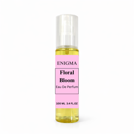 Perfume bottle labeled 'Enigma Floral Bloom' on a white background